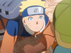 Young Naruto Uzumaki in his orange jacket and Leaf headband, crouching on rocky ground and looking up wide-eyed at a figure in a green cap, from the Naruto x Ninku teaser